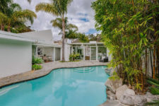 01 This mid-century modern bungalow is Taylor Swift’s guest house, it’s surrounded with tropical palms and lush greneery