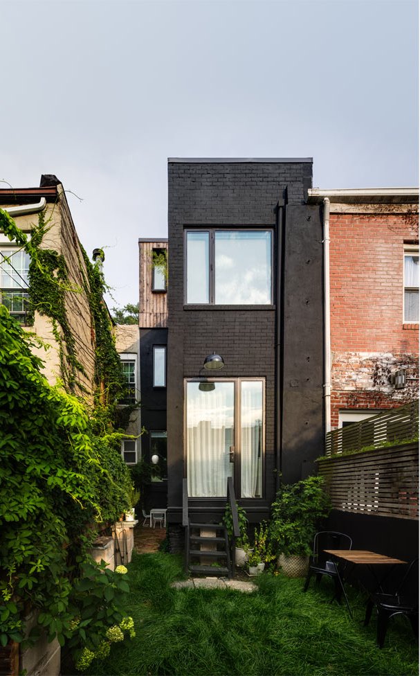 This row house is only 11 foot wide but it doesn't prevent it from being stylish and functional