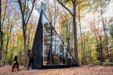 01 This tiny cabin in the woods features a unique crystal shape and is ideal for a weekend or a holiday