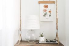 02 a cute swing-style nightstand of wood and rope brings a cute summer feel to the space