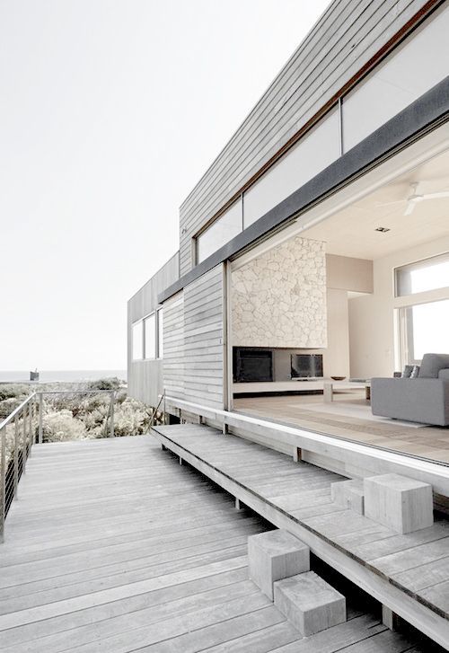 whitewashed on the outside and all-neutral inside, this beach home is opened to the ocean
