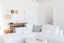 05 a surf shack done in whites with wooden and wicker touches for a modern beach look
