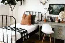 05 a woodland-inspired guest bedroom with a desk by the bed to use it as a nightstand too