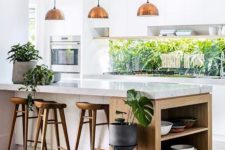 05 continue the outdoor greenery decor with indoor plants to tie the kitchen to outdoors