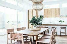 09 a boho beach dining space with wicker furniture and pendants looks very fresh and modern
