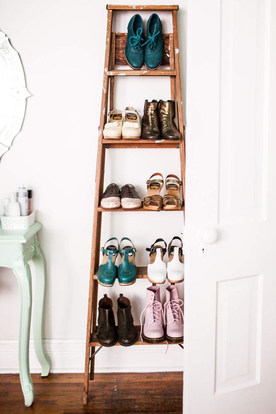 sometimes a vintage ladder with shoes changes the whole look of the room and doesn't require any repainting or changing