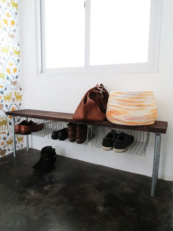 use smart furniture for storage to keep the entryway decluttered