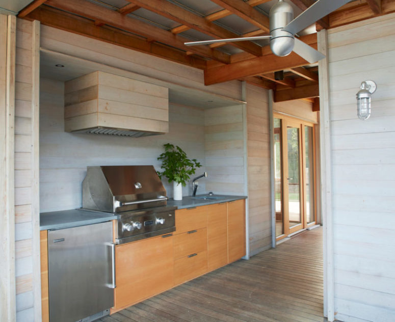 There's also an outdoor kitchen done of reclaimed wood