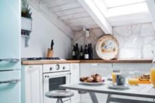 10 a whitewashed kitchen inspired by the beaches and with skylights instead of windows