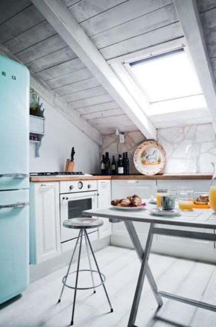 a whitewashed kitchen inspired by the beaches and with skylights instead of windows