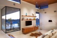 11 a sunken living room with a view and a cozy feeling is all you need after a hard day