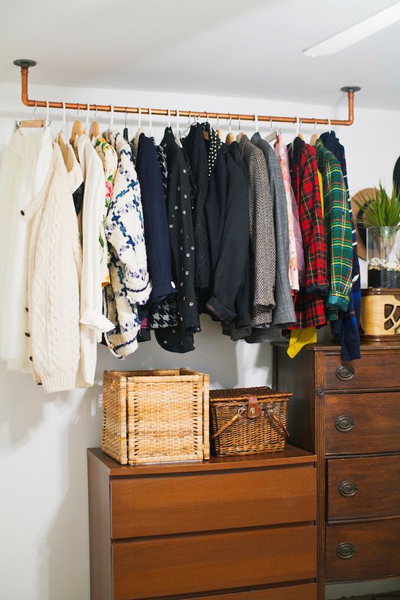a copper rack attached to the ceiling is always a great idea and it can hold a lot of things