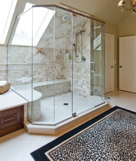a skylight fill the shower with natural light and makes the space cooler and edgier