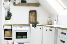 16 a small contemporary kitchen with rustic wooden touches and a skylight instead of a window