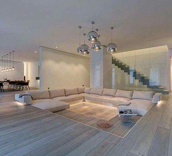 a minimalist sunken living room to separate it bisually and make the space feel cozier