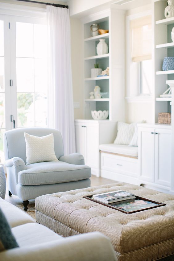 powder blue chairs and touches of this color here and there adds interest to the space