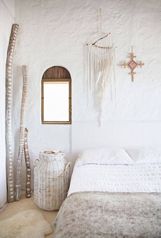 white plaster walls are an amazing idea for a rustic or boho space