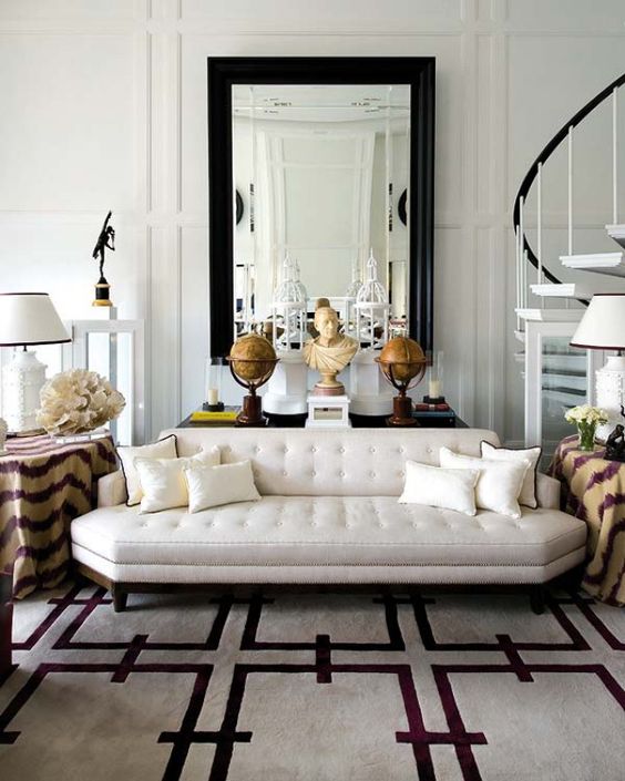 a luxurious off-white couch with geometric lines doesn't look boring at all