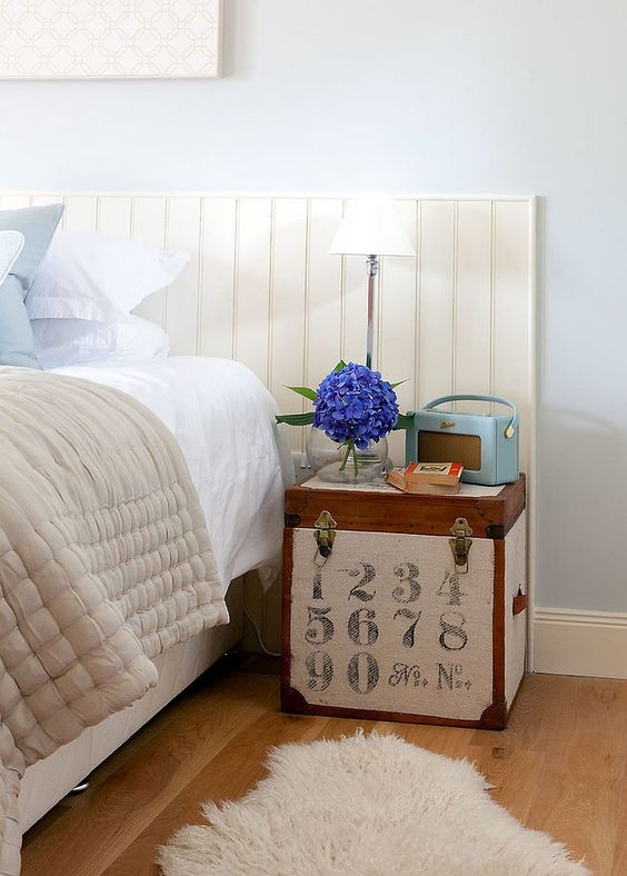 a vintage wooden trunk covered with printed fabric for an industrial touch