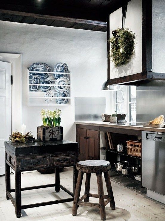 white plaster walls make dark cabinets stand out for a bold modern meets traditional look