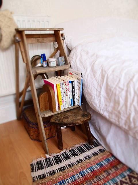 a little wooden ladder and stool for storing all the stuff you may need