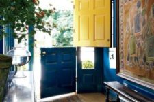 20 a bold entryway with a bright blue and yellow Dutch door that makes a colorful statement