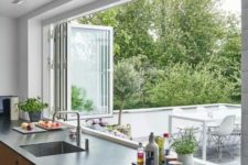 20 a folding window can be a nice idea to connect the kitchen to outdoors and easily serve food outdoors