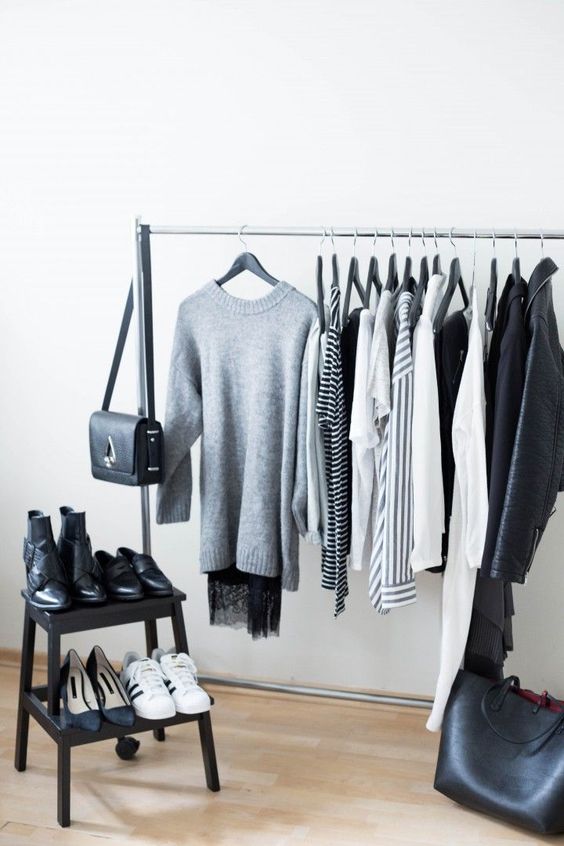a minimalist rack for clothes and a small step shelf for shoes helps to see everything you have at once