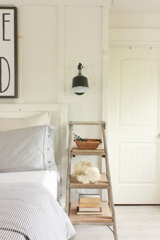 a shabby chic ladder is a nice nightstand that doesn't take much space and features open storage