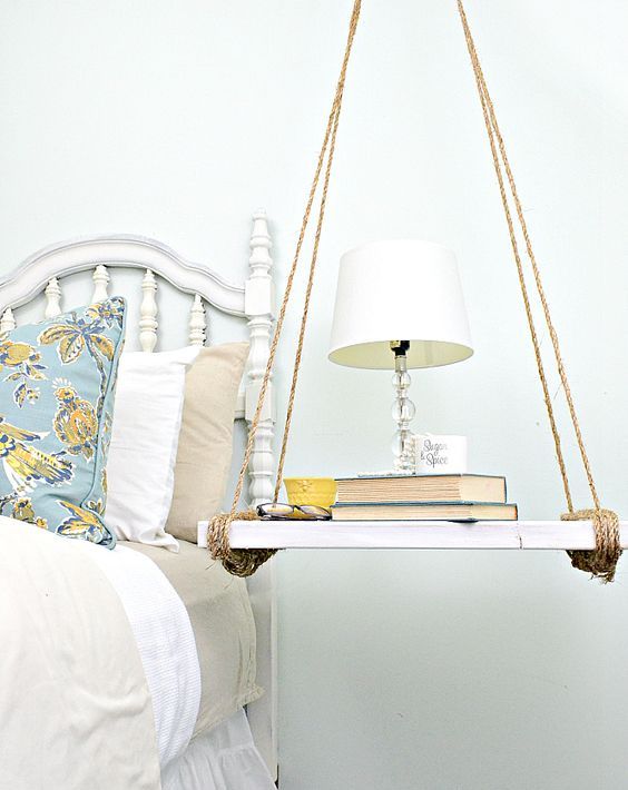 a simple and cute hanging bedside table painted wood and twine for a rustic touch