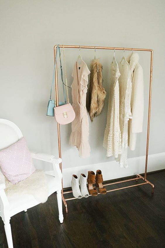 a chic lightweight copper pipe rack with a shelf for shoes is perfect for a girls' room