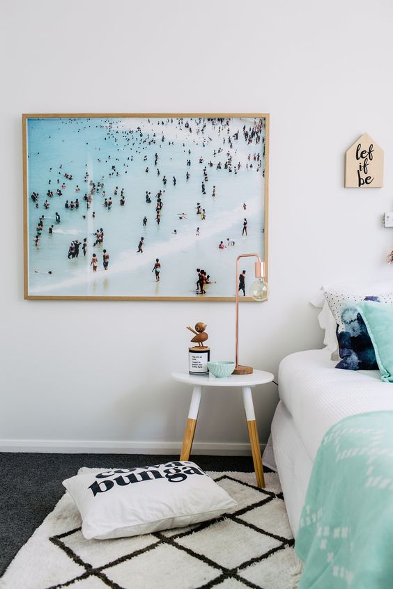 a large beach photo is a refreshing and modern take on traditional beach artworks