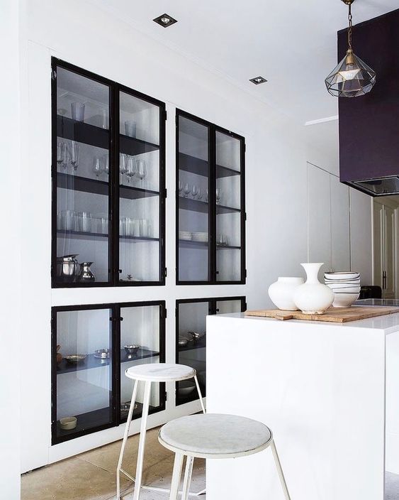 Even built in cabinets with glass doors make your space less cluttered and cozier