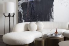 21 with such a rounded sculptural sofa on a metal base your room will be striking