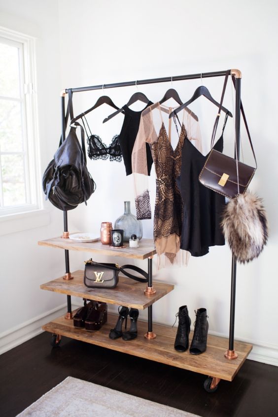 a cool plywood, black pipe and copper details rack will display everything you have the best way possible