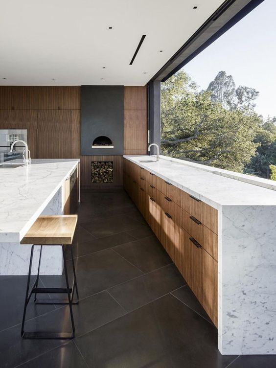 a large window acts as a backsplash too and the views are amazing, the space looks vaster