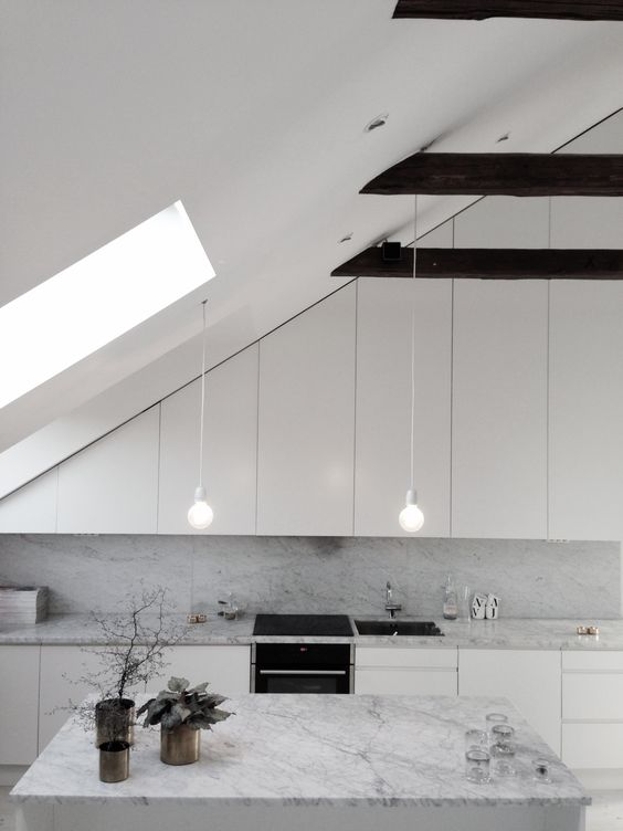 white is great to make the space look larger and airier and some light over the cooking surface is essential