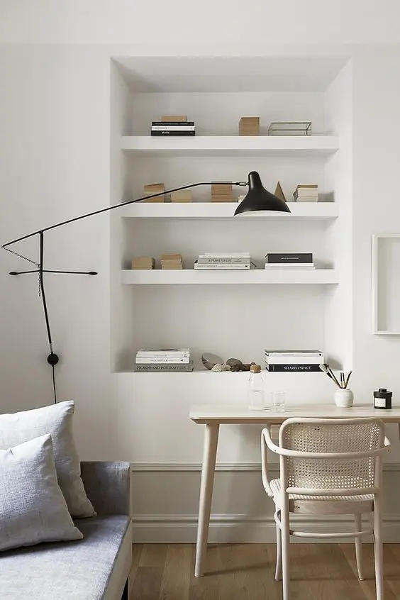Place a convertible sofa and a small lightweight desk plus built in shelves to save much space