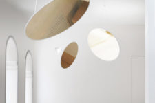 01 Amisol is a unique pendant lamp that doesn’t take much space and has a unique combo – a lamp and a metallic disc