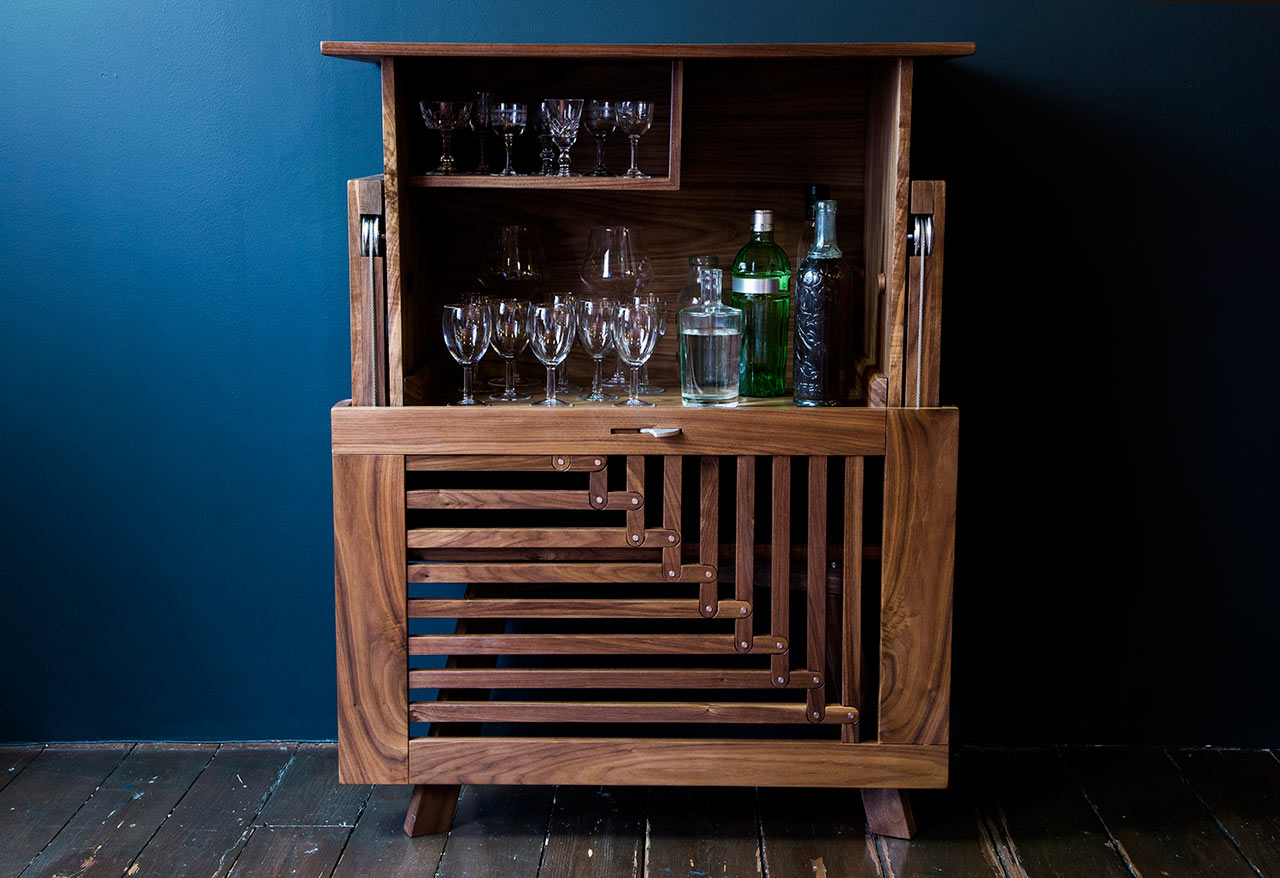 This adorable cabinet is a Drink Cabinet from Space Between Space Collection that acts a small home bar
