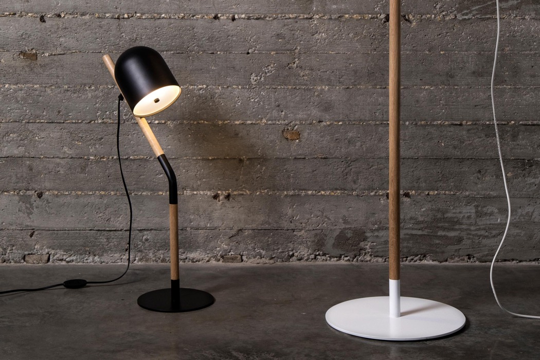 Union lamp collection includes floor and table lamps in black and white that can fit any modern space