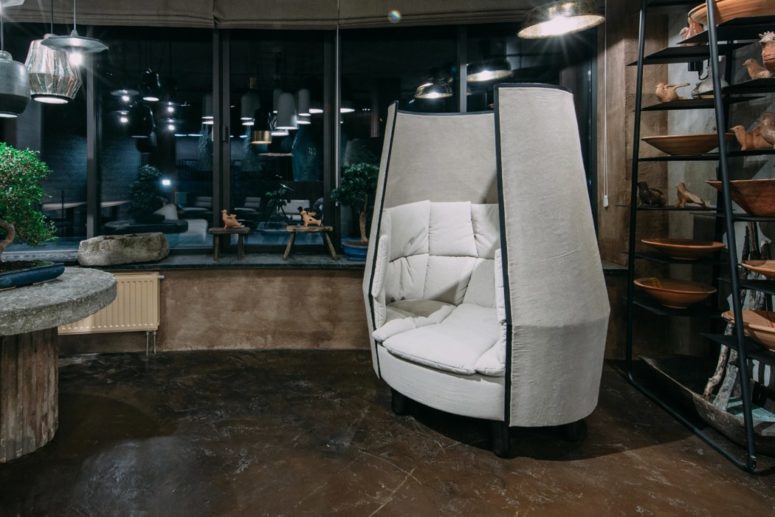 The chair features thick walls with padding for soundproofing and looks like a comfy cocoon