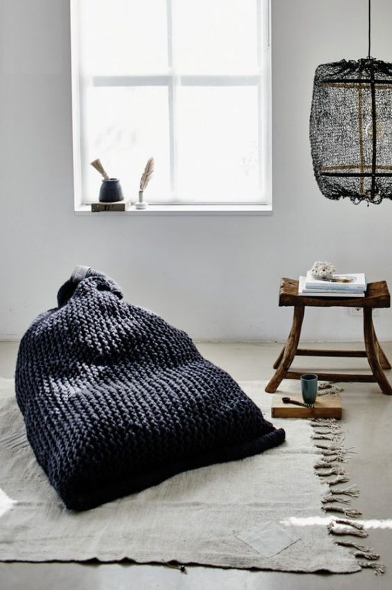 A black chunky knit bean bag chair is a great one for a wabi sabi space