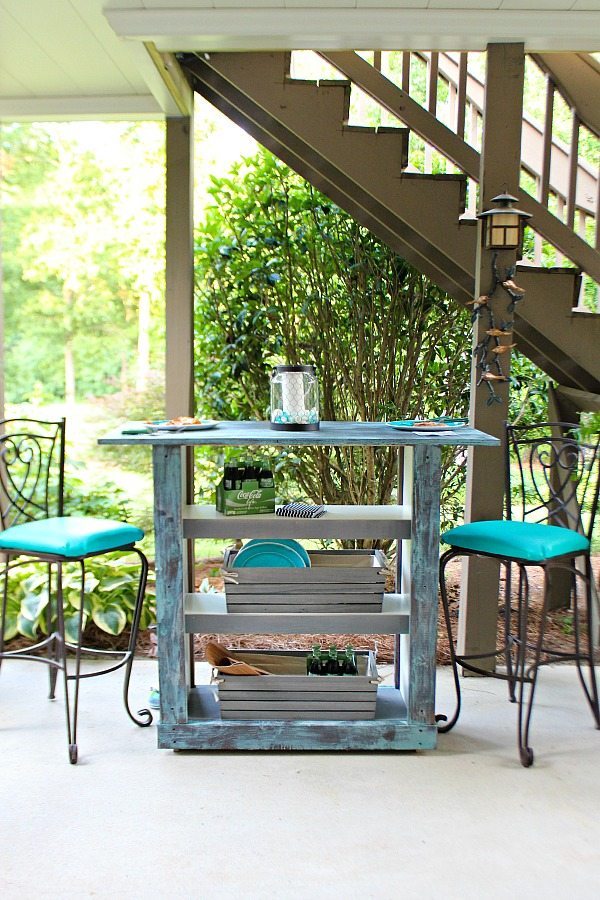 a Billy bookcase turned into a cool shabby chic outdoor bar painted in blue shades