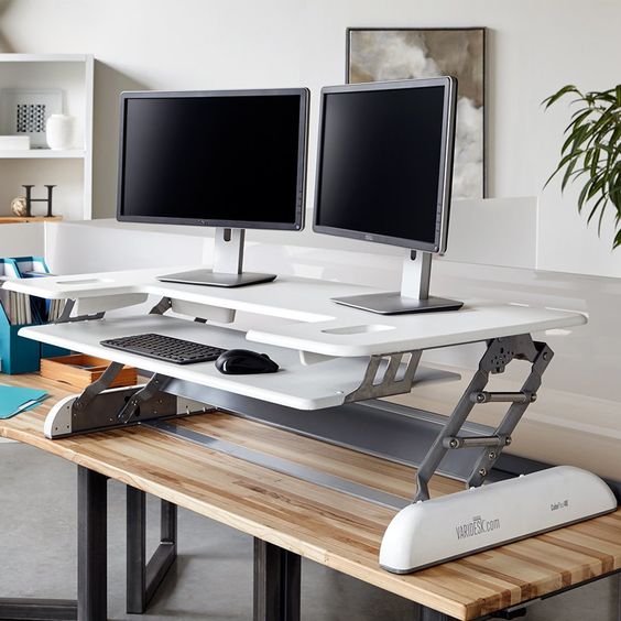 an adjustable metal and white plastic desk system is comfy piece to use if you don't want to change the whole desk