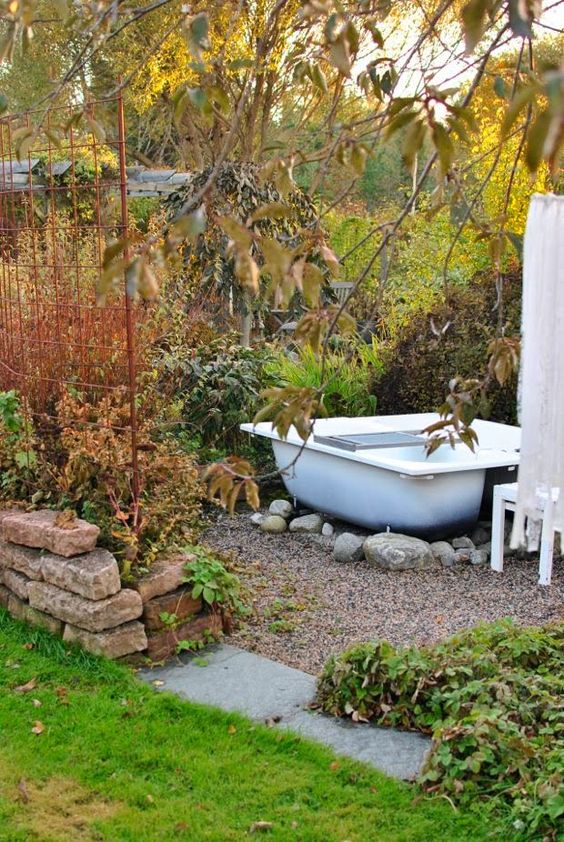 dense greenery and bushes can be another cool idea to keep privacy while taking a bath