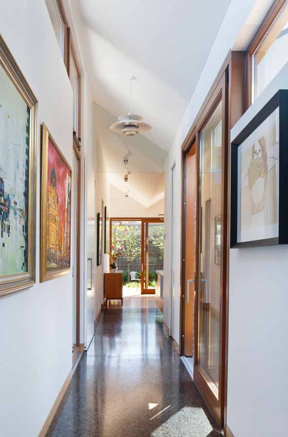 The owners wanted their artwork collection to be displayed, and they were hung in the corridors