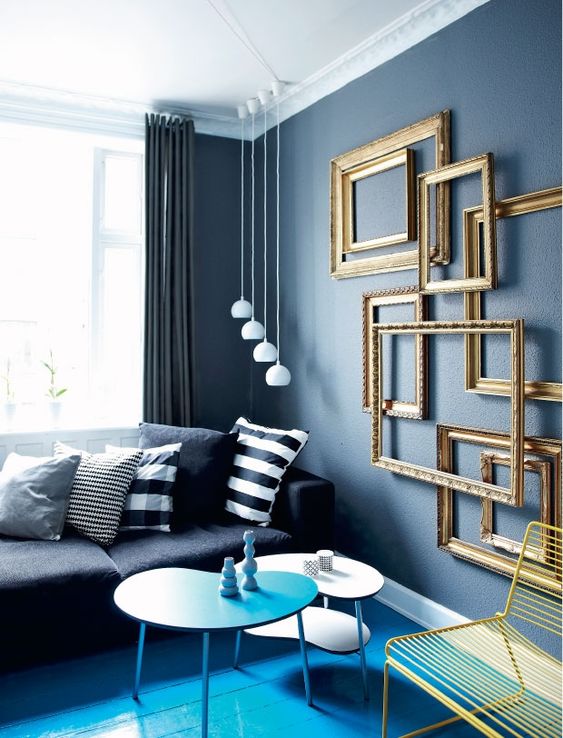 add a refined feel to your living room easily hanging a group of empty frames