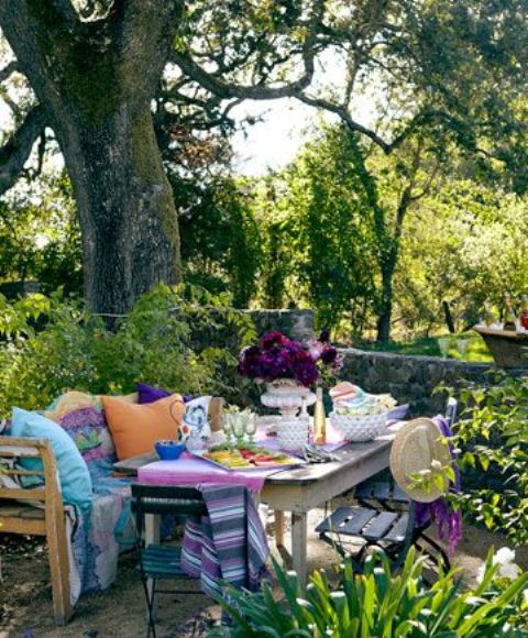 add bright textiles like pillows, blankets, table runners and napkins and a bright floral centerpiece