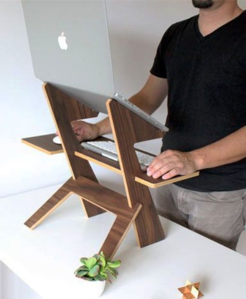 such a simple and chic walnut stand can be used in any space and you may take it with you